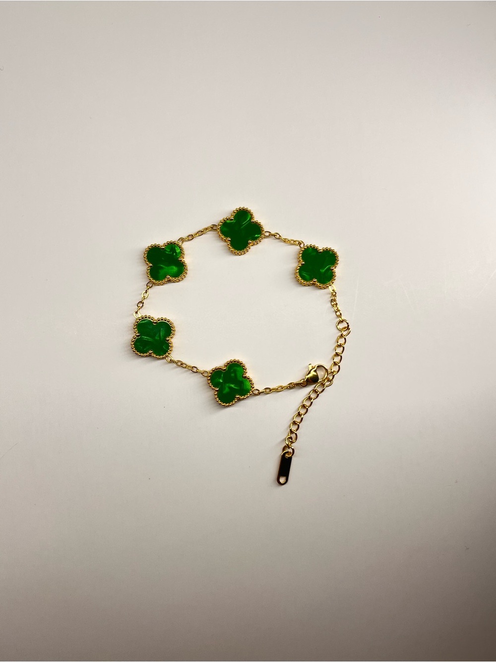 Gold-Tone Bracelet with Green Clover Charms